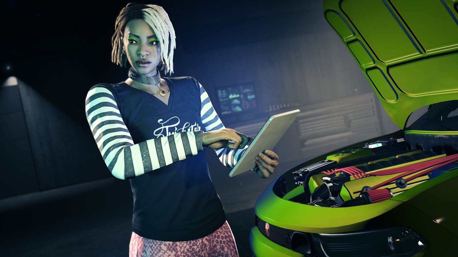 Imani using a tablet beside a green vehicle with its hood raised inside the Agency workshop in GTA Online